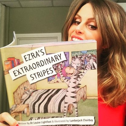 EDS UK book Ezra's Extraordinary stripes held by Ellie Taylor
